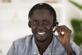 Hotline Operator. Portrait Of Smiling Black Man In Headset Looking At Camera Royalty Free Stock Photo