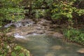 Hotnitsa Waterfall near Veliko Tarnovo province in Bulgaria. Beautiful green scenery landscape in spring time.