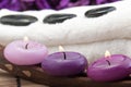Hotstones on towel with purple candles (2)