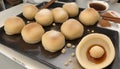 hotteok, Korean Syrup-filled Pancake : Fermented flour dough shaped into balls, filled with a spoonful