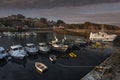 Saint-Gildas-Houat Port in Houat Island as seen in morning from the pier, the village building in the background