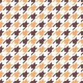 Houndstooth check pattern in orange, brown, white. Seamless simple geometric dog tooth pixel vector background for scarf, dress. Royalty Free Stock Photo