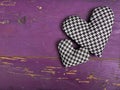 Houndstooth hearts on a pinkbackground