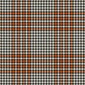 Houndstooth pattern in brown, orange, beige. Seamless dog tooth background vector for dress, scarf, coat. Royalty Free Stock Photo