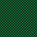 Houndstooth pattern print in black and green. Seamless dark bright simple pixel dog tooth check vector for spring autumn winter. Royalty Free Stock Photo