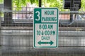 3 hour parking sign in a parking garage