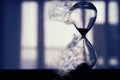 Hourglass as time passing and pass away concept. Royalty Free Stock Photo