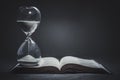 Hourglass on a Bible Royalty Free Stock Photo