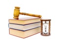 Hourglass, books and judges gavel