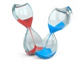 Hourglass cut into two parts with red and blue sand. The concept Royalty Free Stock Photo