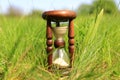 Hourglass in grass