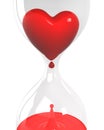 Hourglass with heart and blood closeup Royalty Free Stock Photo