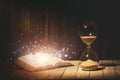 Hourglass and Holy Bible Royalty Free Stock Photo