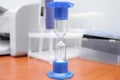 Hourglass on the laboratory table Royalty Free Stock Photo
