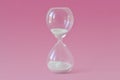 Hourglass on pink background - Concept of health, fertility and biological clock in women