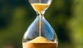 Hourglass with sand flowing. Vintage watches. Time concept Royalty Free Stock Photo