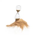 Hourglass and Sand fly in mid air, add more sand of time on gold sand over white background. Brown hourglass show more time