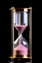 Hourglass sand timer on black Royalty Free Stock Photo