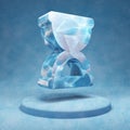 Hourglass Start icon. Cracked blue Ice Hourglass Start symbol on blue snow podium