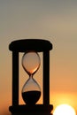 Hourglass in sunset