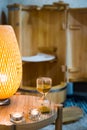 hourglass. time control for procedures. Mini phyto sauna - Cedar barrel. spa treatments. wooden bath. health concept