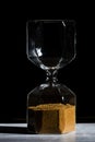 Hourglass of time isolated on black background Royalty Free Stock Photo