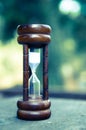 Hourglass time passing concept for business deadline, urgency and running out of time Royalty Free Stock Photo