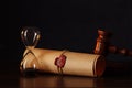 Hourglass, wooden gavel and testament and last will on wooden table in notary office