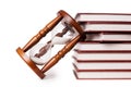 Hourglasses and book isolated Royalty Free Stock Photo