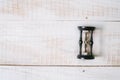 Hourglasses lie on a wooden table. top view. layflat. Royalty Free Stock Photo