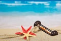 Hourglasses, starfishes on the sea coast Royalty Free Stock Photo