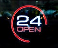 24 hours openly written on the glass door