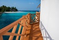 House above sea with wooden bridge and view of tropical island Royalty Free Stock Photo