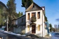 House with ancient architecture and a balcony in a narrow street of Sukhumi.