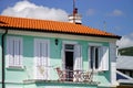 House with balcony on sea resort, sunny day, touristic concept.