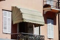 House with balcony on sea resort, sunny day, touristic concept.