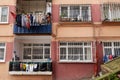 House with bars on the windows and wet clothes Royalty Free Stock Photo