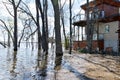 House being threatened by rising flood waters Royalty Free Stock Photo