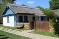 House with bench in Dimitrie Gusti National Village Museum in Bucharest Royalty Free Stock Photo