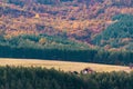 House with big farmland on a forest hill in autumn with vivid colors and sharp detail in Bulgaria, Eastern Europe