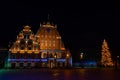 House of Blackheads in the Town Hall Square and the spire of the Cathedral in the historic center of the old city against Royalty Free Stock Photo