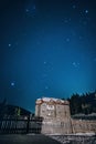 House with blue starry sky at night Royalty Free Stock Photo