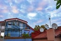 House with blue walls against the sky with clouds Royalty Free Stock Photo