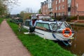 a house bot moored on a canal towpath Royalty Free Stock Photo