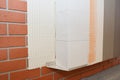 House brick wall renovation, insualtion with glue plastering layers,  reinforcment mesh, aerated concrete blocks, finishing render Royalty Free Stock Photo