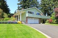 House with brick wall trim and garage Royalty Free Stock Photo