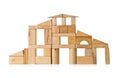 House build from wooden building block pieces over white