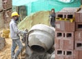 House builder (bricklayer) at work