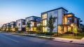 House building and city construction concept: evening outdoor urban view of modern real estate homes Royalty Free Stock Photo