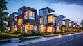 House building and city construction concept: evening outdoor urban view of modern real estate homes Royalty Free Stock Photo